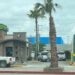 Denuncian a personal de Obras Públicas instalando lámparas en negocio «Helados Sultana»